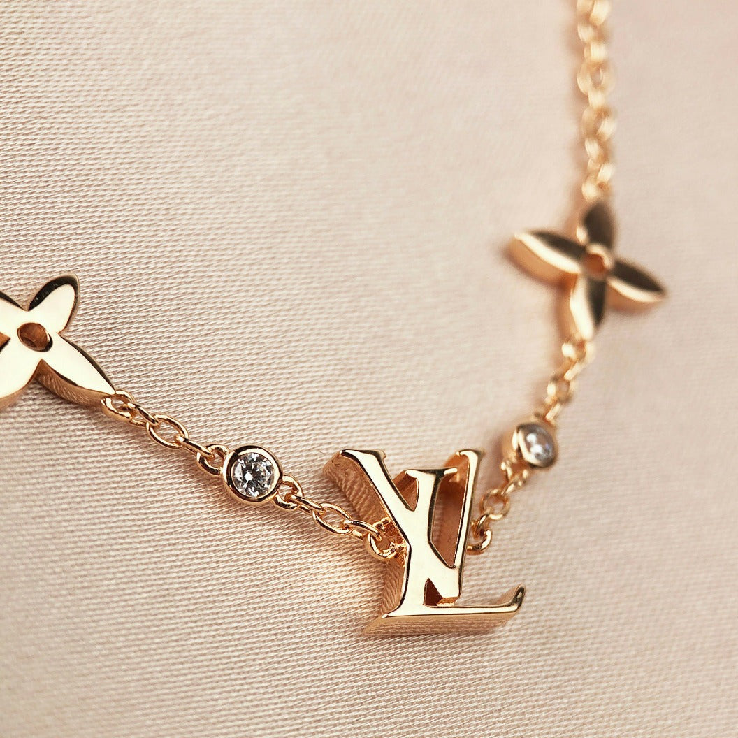 [Everoly JW]STAR AND SUN 7 MOTIFS GOLD BRACELET
