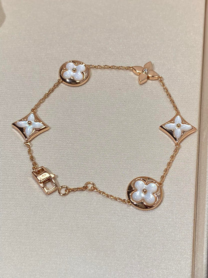 [Everoly JW]STAR AND SUN 5 MOTIF MOP PINK GOLD BRACELET