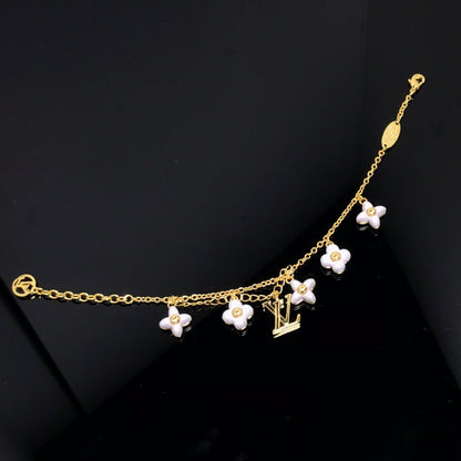 [Everoly JW]LOGO 6 MOTIF STAR AND SUN GOLD BRACELET