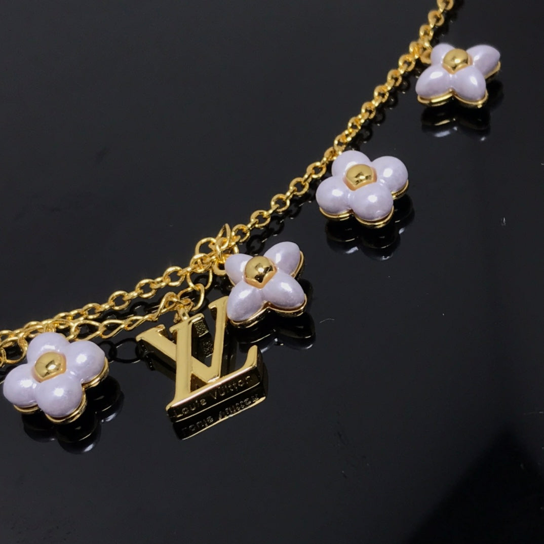 [Everoly JW]LOGO 6 MOTIF STAR AND SUN GOLD BRACELET