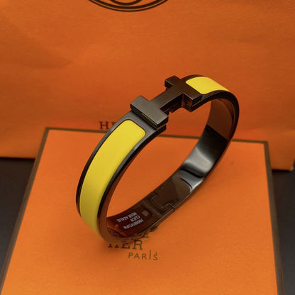 [Everoly JW]CLIC HM SO SCHWARZ GELB ARMBAND