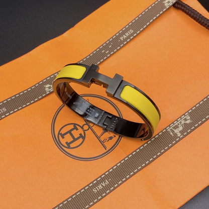 [Everoly JW]CLIC HM SO SCHWARZ GELB ARMBAND
